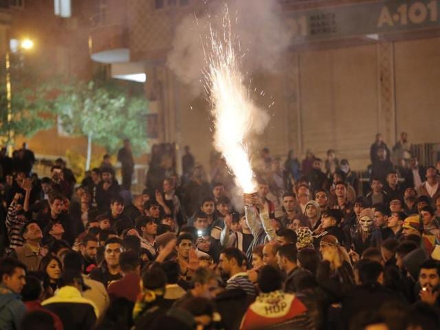 People use fireworks as they celebrate preliminary election results of the pro-Kurdish Peoples's Democratic Party (HDP) in Diyarbakir, in Turkey's predominantly Kurdish southeast. (AP)