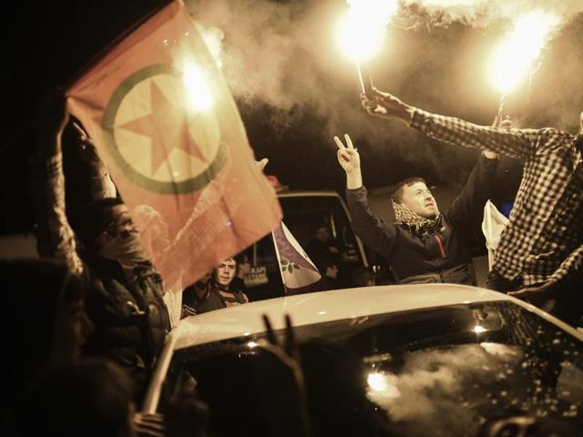 Supporters of Turkey's pro-Kurdish People's Democratic Party (HDP) celebrate in the southeastern city of Diyarbakir after polls closed on November 1, 2015. (AFP)