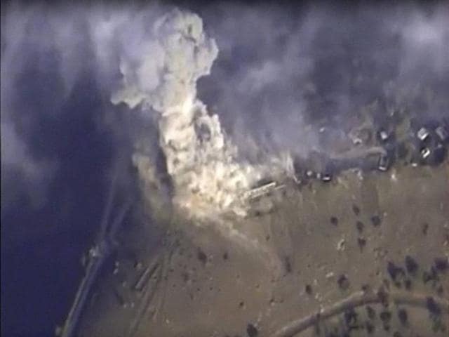 Russian defence ministry : This photo made from the footage taken from Russian defence ministry official web site on Monday, Nov 2, 2015 shows a target hit during Russian air raid in Syria. (AP/PTI Photo) Russian defence ministry : This photo made from the footage taken from Russian defence ministry official web site on Monday, Nov 2, 2015 shows a target hit during Russian air raid in Syria. (AP/PTI Photo)