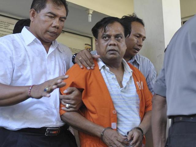 Police escort Indian gangster Rajendra Nikalje, widely known as Chhota Rajan, at police headquarters in Denpasar, Bali November 2, 2015. (REUTERS) Police escort Indian gangster Rajendra Nikalje, widely known as Chhota Rajan, at police headquarters in Denpasar, Bali November 2, 2015. (REUTERS)
