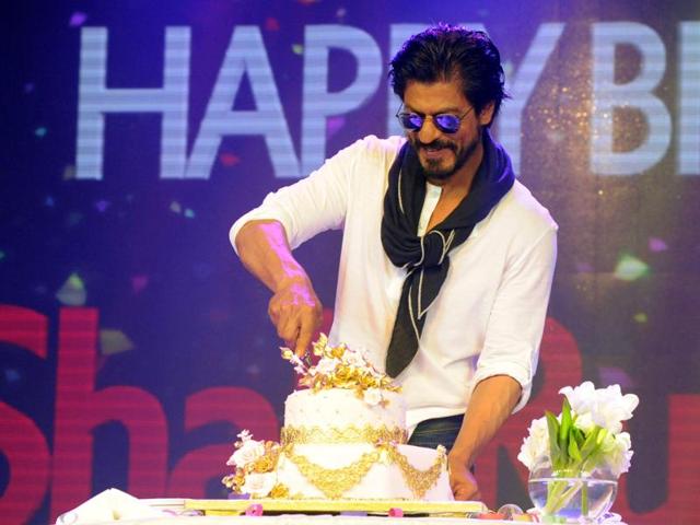 Shah Rukh Khan cuts his birthday cake to in Mumbai on Monday. (AFP) Shah Rukh Khan cuts his birthday cake to in Mumbai on Monday. (AFP)