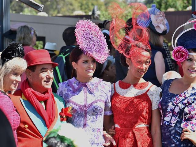 Models pose ahead of the competition at Flemington Racecourse. (AFP)