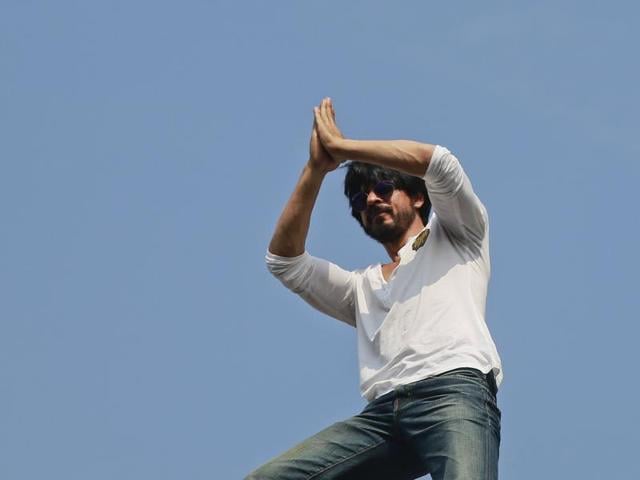 Shah Rukh Khan greets his fans who have gathered outside his home on his birthday in Mumbai on Monday. (AP) Shah Rukh Khan greets his fans who have gathered outside his home on his birthday in Mumbai on Monday. (AP)