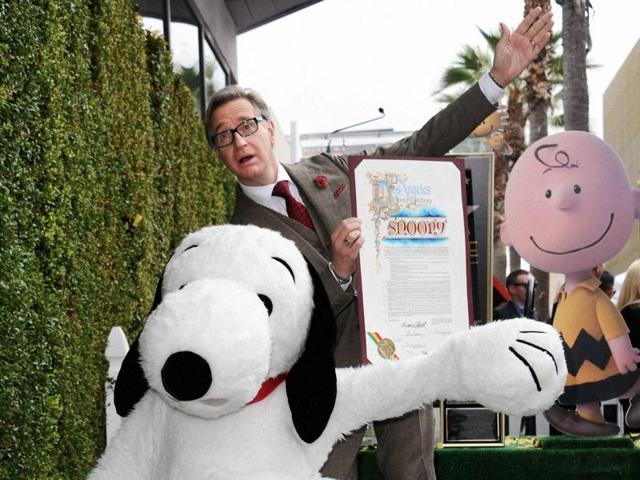 Snoopy and producer Paul Feig attend a ceremony honouring Snoopy with a star on the Hollywood Walk of Fame on Monday. (AP)