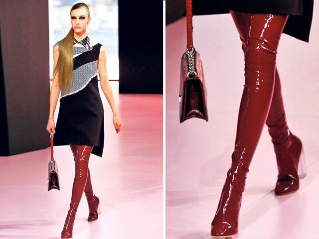 Bold red boots set the tone for the risque-high footwear trend. (AFP)