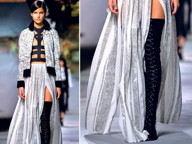 Combine these boots with long dresses or split skirt to get that perfect winter look. (AFP)