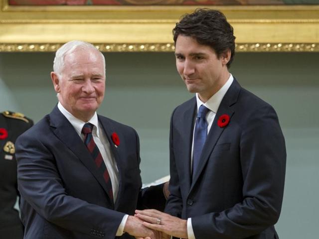 Canadian Prime Minister Justin Trudeau (right) shakes hands with Governor General David Johnston after being sworn in as Prime Minister in Ottawa.(AFP) Canadian Prime Minister Justin Trudeau (right) shakes hands with Governor General David Johnston after being sworn in as Prime Minister in Ottawa.(AFP)