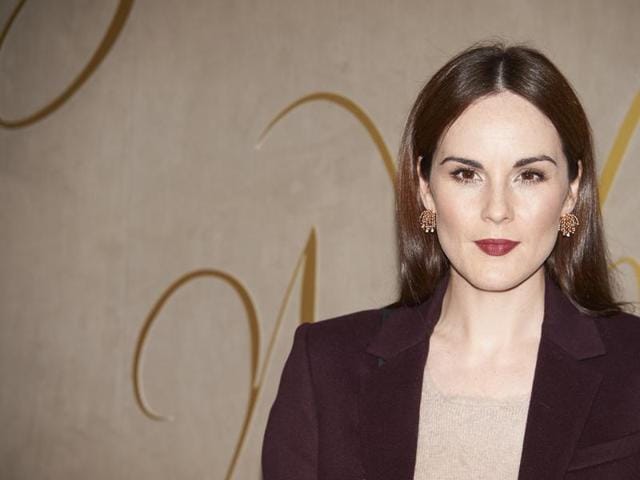 British actor Michelle Dockery, famous for Downton Abbey arrives at the premiere of the Burberry festive film. (AFP)