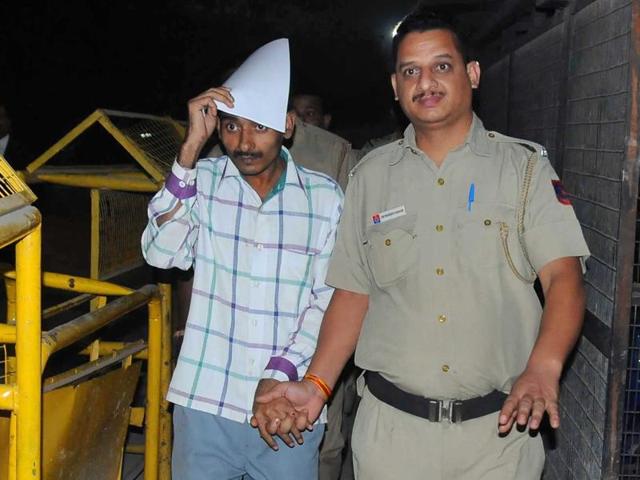 Uber Rape case convict cab driver Shiv Kumar comes out after being sentenced to life imprisonment, at Tis Hazari Court, in New Delhi, India, on Tuesday. (Arun Sharma/HT Photo) Uber Rape case convict cab driver Shiv Kumar comes out after being sentenced to life imprisonment, at Tis Hazari Court, in New Delhi, India, on Tuesday. (Arun Sharma/HT Photo)