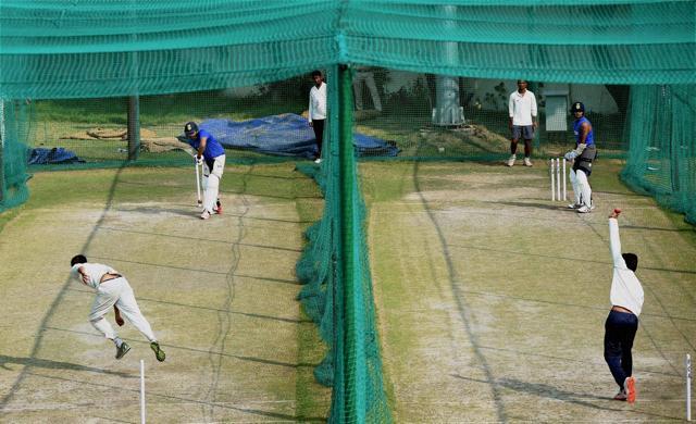 India's Rohit Sharma and Umesh Yadav (r) bat in the nets during a practice session ahead of the first Test match against South Africa in Mohali on Wednesday. (PTI) India's Rohit Sharma and Umesh Yadav (r) bat in the nets during a practice session ahead of the first Test match against South Africa in Mohali on Wednesday. (PTI)