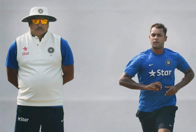 India's Stuart Binny bowls as team Director Ravi Shastri looks on during a practice session ahead of the first Test match against South Africa in Mohali on Wednesday. (PTI) India's Stuart Binny bowls as team Director Ravi Shastri looks on during a practice session ahead of the first Test match against South Africa in Mohali on Wednesday. (PTI)