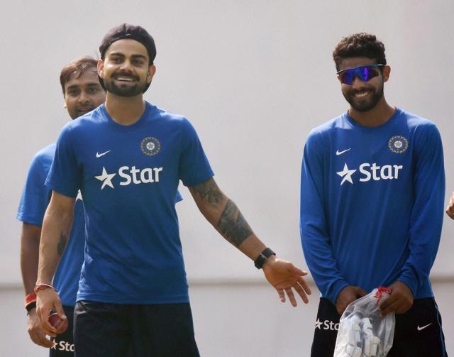 Virat Kohli sharing a light moment with Ravindra Jadeja as Amit Mishra looks on during a practice session ahead of the first Test match against South Africa in Mohali on Wednesday. (PTI) Virat Kohli sharing a light moment with Ravindra Jadeja as Amit Mishra looks on during a practice session ahead of the first Test match against South Africa in Mohali on Wednesday. (PTI)