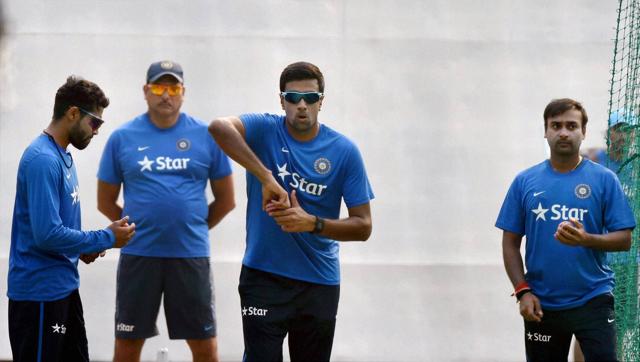 India's team director Ravi Shastri looks on as Ravichandran Ashwin, Amit Mishra and Ravindra Jadeja practice bowling in the nets ahead of the first Test match against South Africa at Mohali on Tuesday. (PTI Photo) India's team director Ravi Shastri looks on as Ravichandran Ashwin, Amit Mishra and Ravindra Jadeja practice bowling in the nets ahead of the first Test match against South Africa at Mohali on Tuesday. (PTI Photo)
