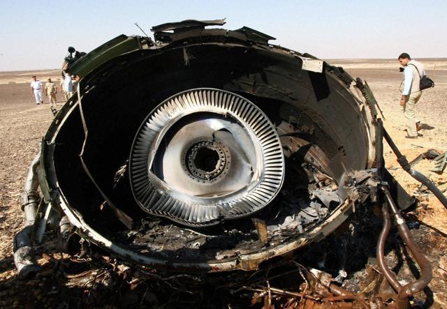 In this photo provided by Russian Emergency Situations ministry, Egyptian military experts examine a piece of an engine at the wreckage of the passenger jet bound that crashed in Hassana, Egypt. (AP Photo) In this photo provided by Russian Emergency Situations ministry, Egyptian military experts examine a piece of an engine at the wreckage of the passenger jet bound that crashed in Hassana, Egypt. (AP Photo)