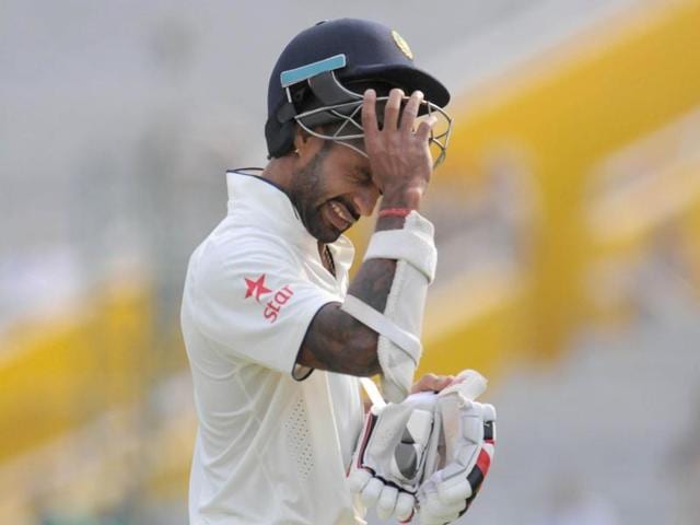 Indian batsman S. Dhawan moving towards the pavilion after being clean bowled by Vernon Philander of South Africa during the test match at PCA stadium, Mohali on Thursday. (Gurpreet Singh/HT)