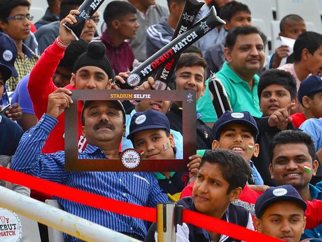 Cricket fans enjoying the first test match between India and South Africa at PCA stadium in Mohali on Thursday. (Gurpreet Singh/HT) 
