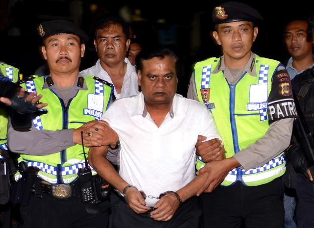 Police escort Indian gangster Rajendra Nikalje, widely known as Chhota Rajan, at police headquarters in Denpasar, Bali November 2, 2015 . Rajan has been deported to India to face charges in more than two dozen murder cases at home. (REUTERS) Police escort Indian gangster Rajendra Nikalje, widely known as Chhota Rajan, at police headquarters in Denpasar, Bali November 2, 2015 . Rajan has been deported to India to face charges in more than two dozen murder cases at home. (REUTERS)