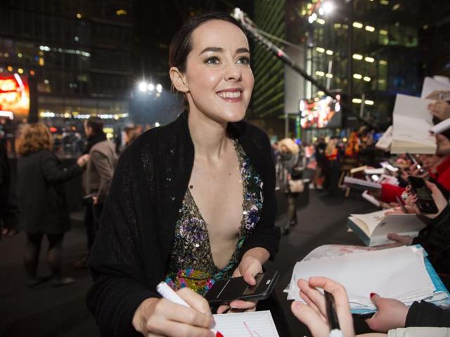 Jena Malone signs autographs before the world premiere of The Hunger Games: Mockingjay - Part 2. (AP)