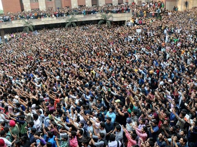 Students gather to get a glimpse of actors Salman Khan and Sonam Kapoor during their visit to Amity University for the promotion of Prem Ratan Dhan Payo in Noida. (PTI)