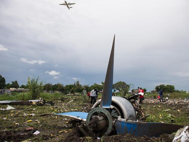 Officials and Red Cross workers remove a dead body of a passenger from the scene of a cargo airplane that crashed after take-off near Juba Airport in South Sudan . The head of the country’s Civil Aviation Authority has said that the plane was not authorised to carry people. (REUTERS Photo) Officials and Red Cross workers remove a dead body of a passenger from the scene of a cargo airplane that crashed after take-off near Juba Airport in South Sudan . The head of the country’s Civil Aviation Authority has said that the plane was not authorised to carry people. (REUTERS Photo)