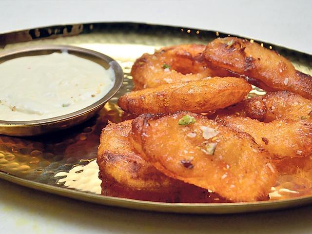 Hot batter fried crispy apple jalebi. Hot batter fried crispy apple jalebi.
