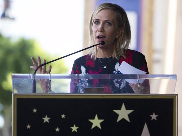 Kristen Wiig speaks at the unveiling of the star for director Ridley Scott on the Hollywood Walk of Fame in Los Angeles. She starred in The Martian for Scott. (REUTERS)