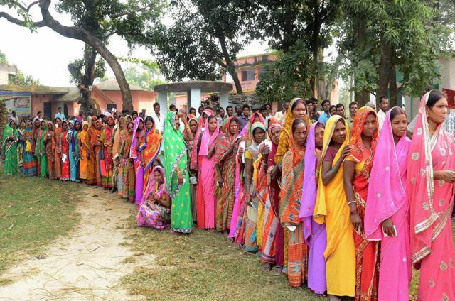 Voters wait in a queue to cast their votes during the fifth phase of Bihar elections in Madhepura. (PTI Photo) Voters wait in a queue to cast their votes during the fifth phase of Bihar elections in Madhepura. (PTI Photo)