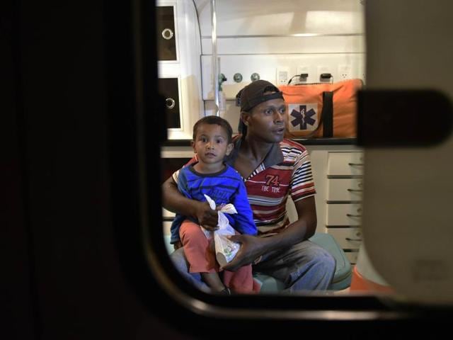 Survivors wait in an ambulance after a dam burst in the village of Bento Rodrigues, in Mariana, the southeastern Brazilian state of Minas Gerais on November 5, 2015. (AFP Photo) Survivors wait in an ambulance after a dam burst in the village of Bento Rodrigues, in Mariana, the southeastern Brazilian state of Minas Gerais on November 5, 2015. (AFP Photo)