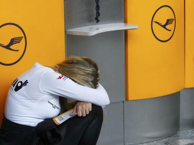 Cabin staff of German airline Lufthansa hold placards during a demonstration outside the airport in Frankfurt am Main, on November 6, 2015 as the flight attendants' union UFO has called a nine-hour strike, beginning a week of walkouts in a long-running battle over savings aimed at fending off competition from low-cost rivals. (AFP) Cabin staff of German airline Lufthansa hold placards during a demonstration outside the airport in Frankfurt am Main, on November 6, 2015 as the flight attendants' union UFO has called a nine-hour strike, beginning a week of walkouts in a long-running battle over savings aimed at fending off competition from low-cost rivals. (AFP)