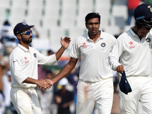 India's Ajinkya Rahane (L) congratulates teammate Ravichandran Ashwin (C) after his dismissal of South Africa's Imran Tahir. (AFP Photo) India's Ajinkya Rahane (L) congratulates teammate Ravichandran Ashwin (C) after his dismissal of South Africa's Imran Tahir. (AFP Photo)