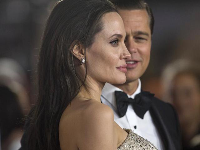While Angelina Jolie Pitt rocked a strapless gown with jewel detailing, Brad was dressed in a natty tuxedo with his hair stylishly slicked back. (REUTERS) While Angelina Jolie Pitt rocked a strapless gown with jewel detailing, Brad was dressed in a natty tuxedo with his hair stylishly slicked back. (REUTERS)