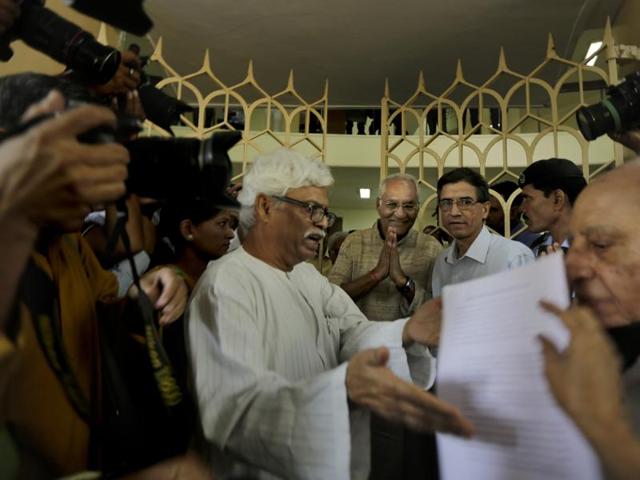 Writers handover a memorandum to Vishwanath Prasad Tiwari (centre), President of Sahitya Akademi, after a protest march in New Delhi in October. (AP) Writers handover a memorandum to Vishwanath Prasad Tiwari (centre), President of Sahitya Akademi, after a protest march in New Delhi in October. (AP)