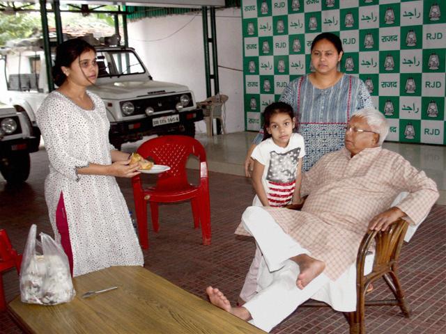 Lalu Prasad with his family members after last phase of Bihar assembly elections in Patna. (PTI) Lalu Prasad with his family members after last phase of Bihar assembly elections in Patna. (PTI)