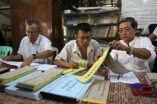 Officials prepare a polling station ahead of Myanmar's general elections, in Yangon. (REUTERS) Officials prepare a polling station ahead of Myanmar's general elections, in Yangon. (REUTERS)