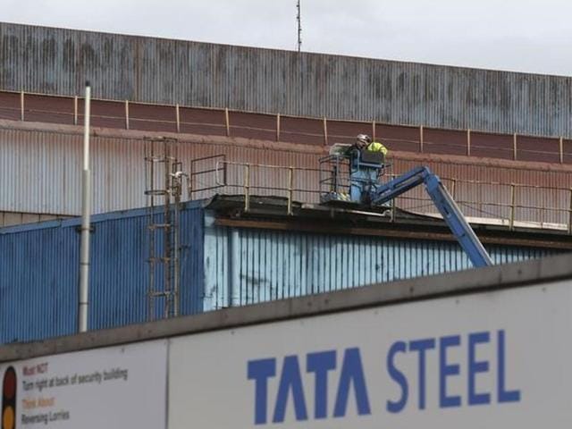 Workers use an elevated work platform at the Tata Steel plant in Motherwell, Scotland, Britain.(Reuters File Photo) Workers use an elevated work platform at the Tata Steel plant in Motherwell, Scotland, Britain.(Reuters File Photo)