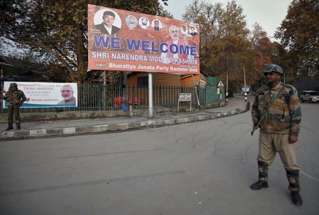 Security personnel stand guard near the venue where Indian Prime Minister Narendra Modi will address a rally on Saturday, in Srinagar. (Reuters Photo) Security personnel stand guard near the venue where Indian Prime Minister Narendra Modi will address a rally on Saturday, in Srinagar. (Reuters Photo)