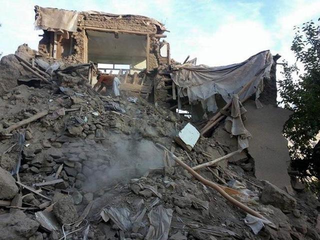 At least 150 people were in the factory when it came down. (AFP Photo) At least 150 people were in the factory when it came down. (AFP Photo)