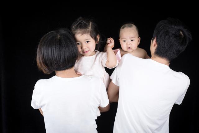 Wang Jie with her husband and two children. Wang Jie with her husband and two children.