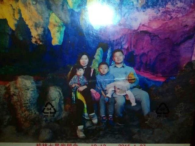 Zang Sha with her family. Zang Sha with her family.
