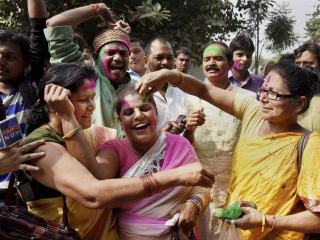 Supporters celebrate Mahagathbandhan's (Grand Alliance) victory in Bihar assembly elections in Patna on Sunday. (PTI)