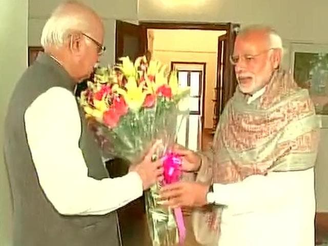 Prime Minister Narendra Modi with senior BJP leader LK Advani.(AFP File Photo)