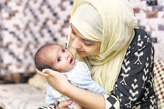 Hayat Fatima, 26, often plays the Selfie Le Le to calm her cranky newborn. “The human body, from the time of conception, incorporates music into its functions,” says surgeon Dr A Sampath Kumar. (Saumya Khandelwal/Hindustan Times)