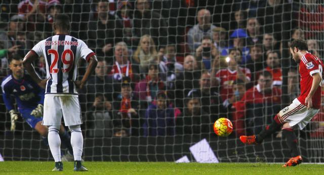 Juan Mata shoots a penalty for Manchester United’s second goal. (Reuters Photo)