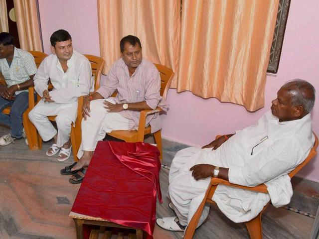 HAM (S) chief Jitan Ram Manjhi with party workers at his residence in Gaya on Saturday. (PTI)