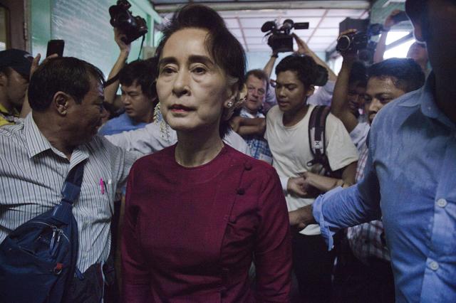 Myanmar opposition leader and head of the National League for Democracy (NLD) Aung San Suu Kyi leaves a polling station after casting her vote in Yangon. (AFP Photo) Myanmar opposition leader and head of the National League for Democracy (NLD) Aung San Suu Kyi leaves a polling station after casting her vote in Yangon. (AFP Photo)