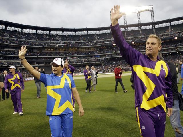 Sachin Tendulkar, left, and Shane Warne wave at fans as they take a lap around the field after the first game of the Cricket All-Stars series on November 7, 2015, at Citi Field in New York. Warne’s Warriors beat Sachin’s Blasters by six wickets in the first game. (AP Photo) Sachin Tendulkar, left, and Shane Warne wave at fans as they take a lap around the field after the first game of the Cricket All-Stars series on November 7, 2015, at Citi Field in New York. Warne’s Warriors beat Sachin’s Blasters by six wickets in the first game. (AP Photo)