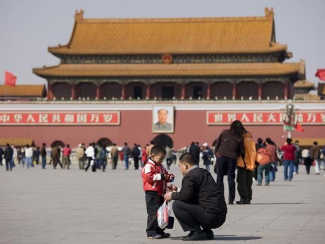 The little emperors: A father and son at the Gate of Heavenly Peace in Tiananmen Square, Beijing. Last week, China scrapped its nearly-four-decade-old one-child policy to allow couples to have a second baby. (Tim Graham/Getty Images) The little emperors: A father and son at the Gate of Heavenly Peace in Tiananmen Square, Beijing. Last week, China scrapped its nearly-four-decade-old one-child policy to allow couples to have a second baby. (Tim Graham/Getty Images)