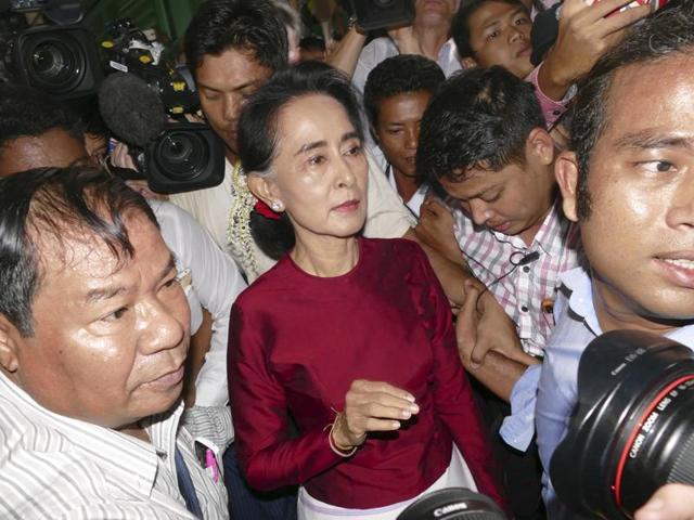 Myanmar opposition leader Aung San Suu Kyi leaves after casting her ballot at a polling station in general election in Yangon. (AP) Myanmar opposition leader Aung San Suu Kyi leaves after casting her ballot at a polling station in general election in Yangon. (AP)