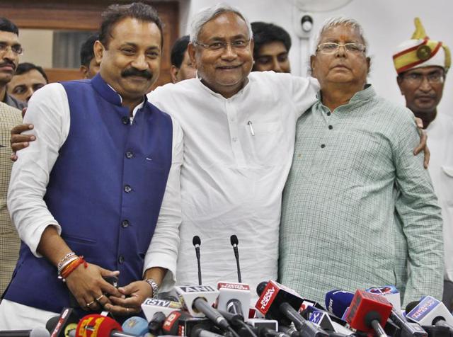 Janta Dal (U) leader Nitish Kumar and Rashtriya Janta Dal leader Lalu Prasad Yadav and Ashok Choudhary , president of the Bihar Pradesh Congress Committee at a press conference after victory in Bihar assembly election, in Patna on Sunday. (Ajay Aggarwal/HT photo) Janta Dal (U) leader Nitish Kumar and Rashtriya Janta Dal leader Lalu Prasad Yadav and Ashok Choudhary , president of the Bihar Pradesh Congress Committee at a press conference after victory in Bihar assembly election, in Patna on Sunday. (Ajay Aggarwal/HT photo)