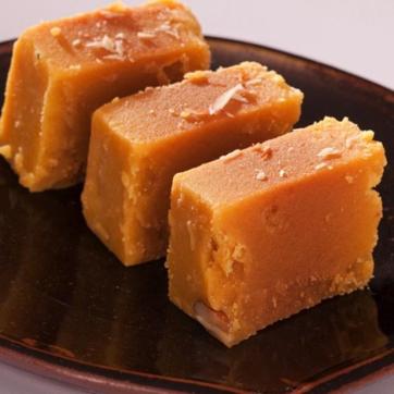 Mysore Pak is a combination of three ingredients – ghee, sugar and gram flour. Mysore Pak is a combination of three ingredients – ghee, sugar and gram flour.